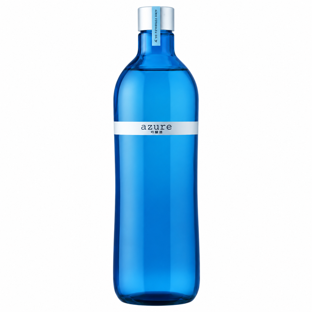A tall, translucent blue bottle with a white label reading &