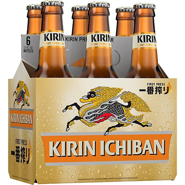 Six-pack of Kirin Ichiban beer bottles in a cardboard holder with brand logo.